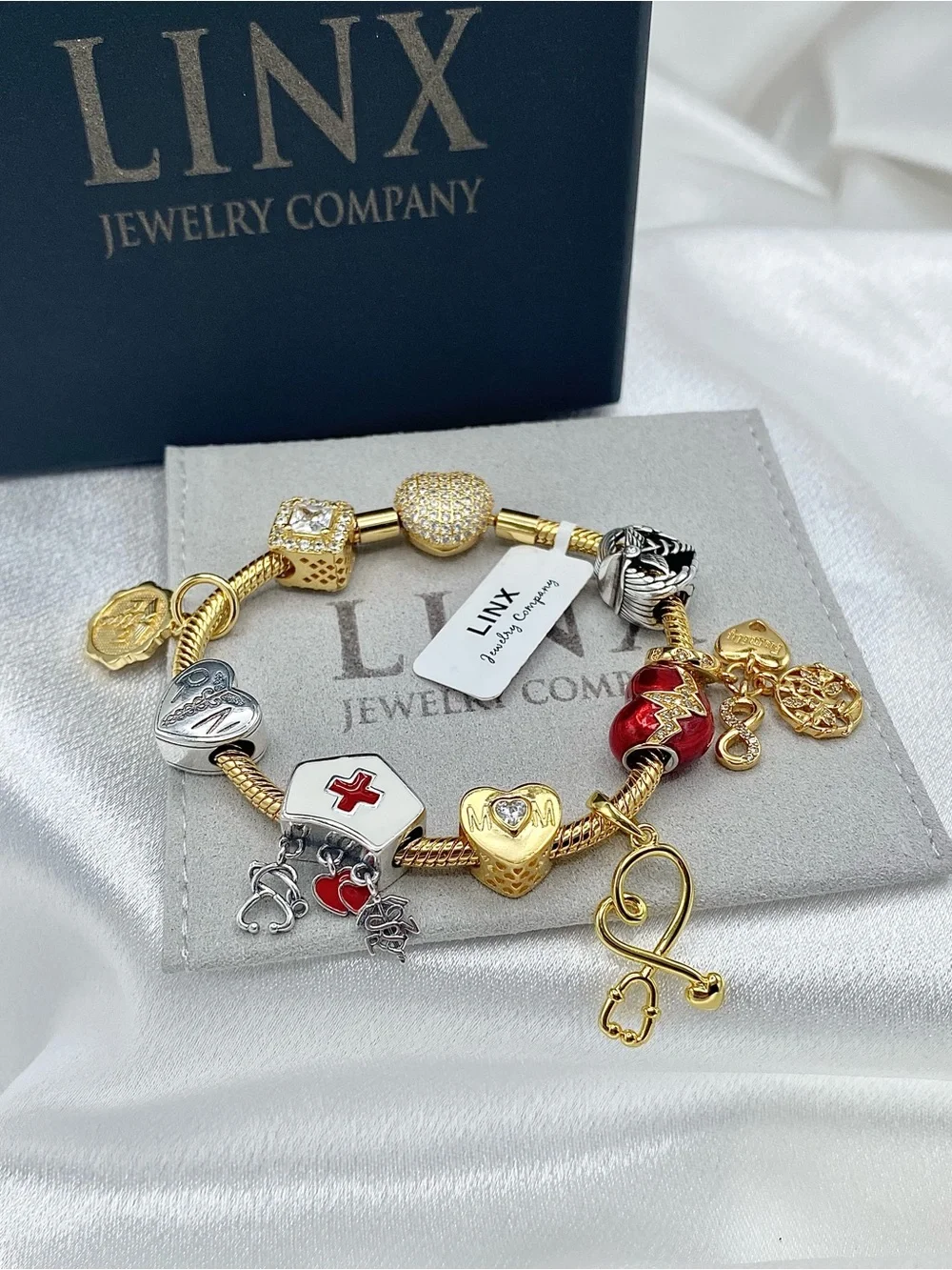Linx Gold Snake Chain Charm Bracelet with Registered Nurse, Mom & Family Charms